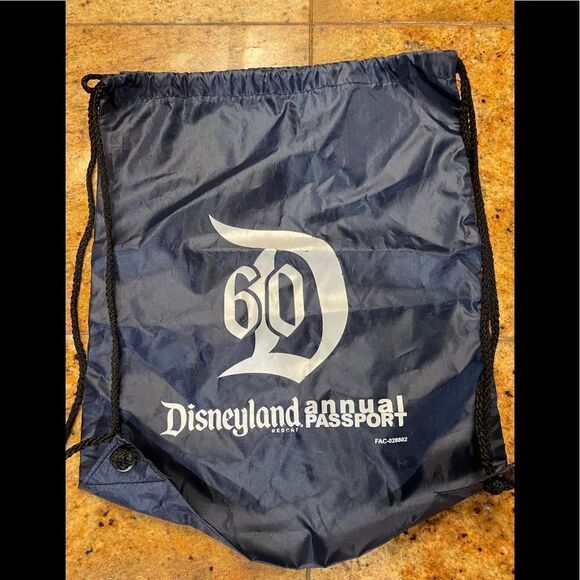 Disney Handbags - Disneyland Resort 60 annual passport DrawString Bag